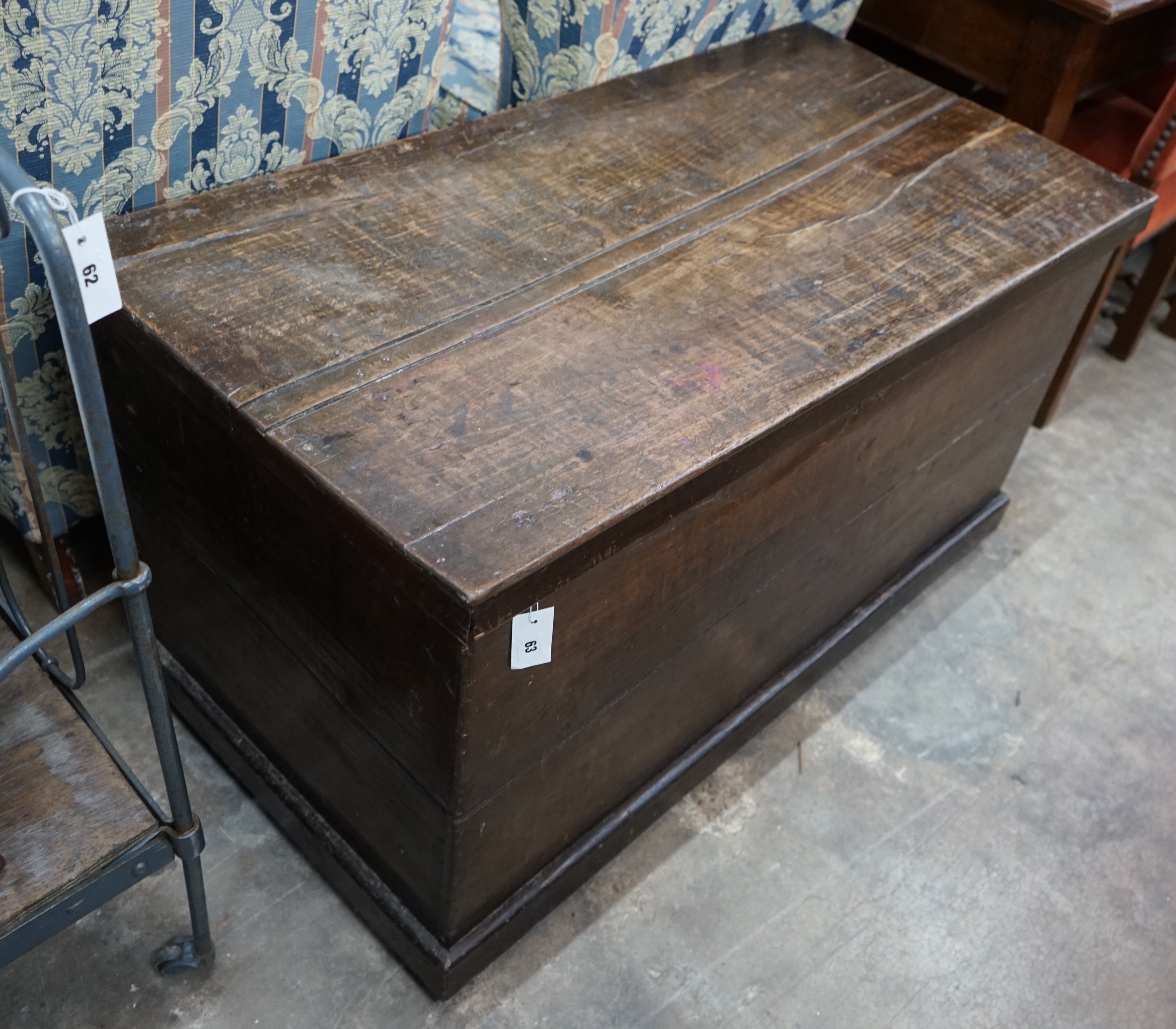 A 19th century elm trunk, width 116cm depth 61cm height 66cm